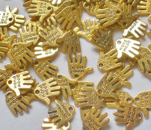 Quantity 80 &ndash;Little  Hand Charms saying "Hand Made"  13mm X 12mm Goldtone metal Alloy Charm