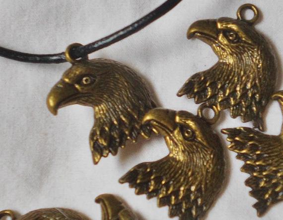Quantity 10 &ndash;Bronze EAGLE HEAD 18mm X 21mm Charms or Pendants -Lots of detail -2mm Hole at top